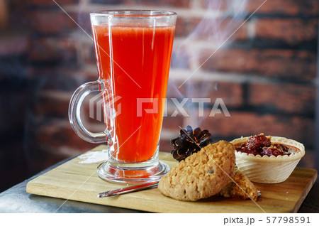 Delicious hot cocktail with cookies Delicious hot cocktail with cookies 57798591