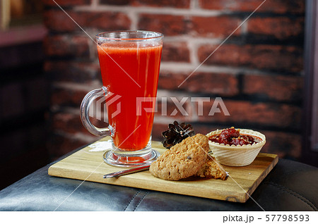 Delicious drink in a mug with cookies Delicious drink in a mug with cookies 57798593