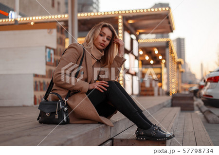 Beautiful young attractive fashionable woman Beautiful young attractive fashionable woman 57798734