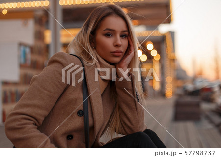 Pretty cute stylish attractive young blond woman Pretty cute stylish attractive young blond woman 57798737