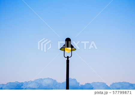 Vintage retro light pole with blue sky background 57799871