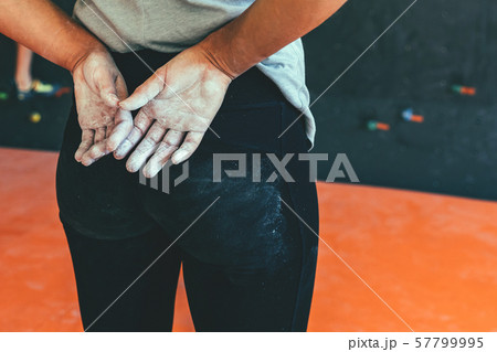 Woman hands covered ith magnesia powder. 57799995