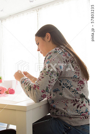 Young attractive girls in a crochet lesson 57803235