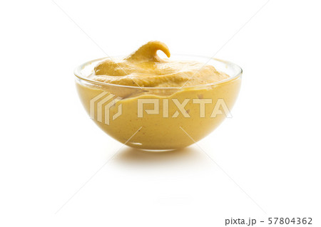 Yellow mustard in bowl 57804362