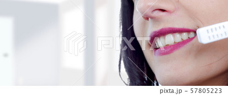 brunette female support phone operator in headset, brunette female support phone operator in headset, 57805223