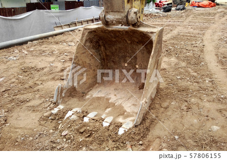 Excavation work using excavator machine at the construction site. Excavation work using excavator machine at the construction site. 57806155