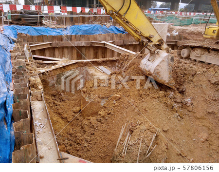 Excavation work using excavator machine at the construction site. 57806156