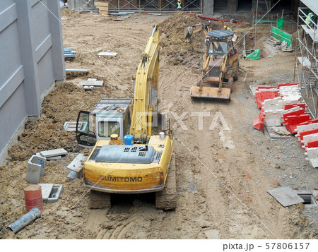 Excavation work using excavator machine at the construction site. Excavation work using excavator machine at the construction site. 57806157