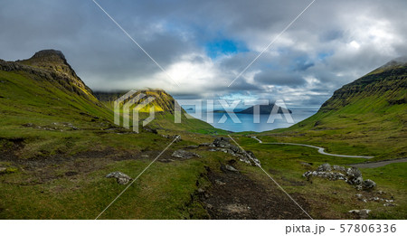 Panorama of valley in Faroe Islands with road 57806336