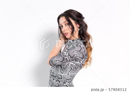 Latin dance, bachata lady, jazz modern and vogue dance concept - Beautiful young woman dancing on 57808312