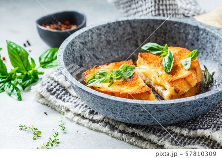 Fried sandwiches with cheese and wheat bread  57810309