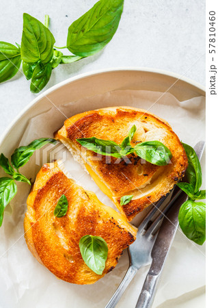 Fried sandwiches with cheese and basil Fried sandwiches with cheese and basil 57810460