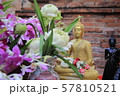 Buddha statue fowers lotus  57810521