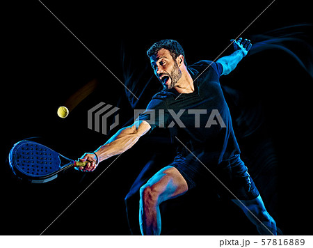 Paddle tennis player man light painting isolated black background 57816889