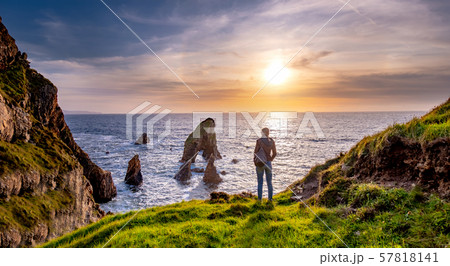 Crohy Head Sea Arch Breeches during sunset - County Donegal, Ireland Crohy Head Sea Arch Breeches during sunset - County Donegal, Ireland 57818141