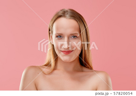 Beautiful smiling girl looking straight forward 57820054