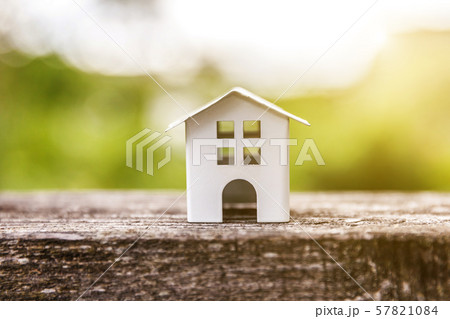 Miniature white toy model house in wooden Miniature white toy model house in wooden 57821084