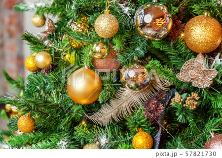 Classic New Year decorated Christmas tree Classic New Year decorated Christmas tree 57821730