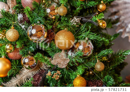 Classic New Year decorated Christmas tree 57821731