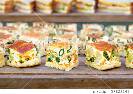 Food industry. Slider bar background. Vegan sliders, ham and vegetable slider bar. Buffet food for 57822145