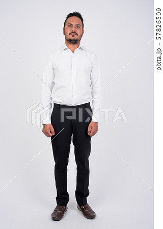 Full body shot of bearded Indian businessman Full body shot of bearded Indian businessman 57826509
