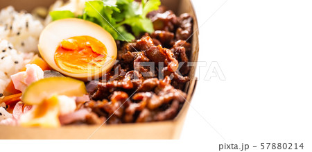 Japanese asian meal in a box of recycled paper Japanese asian meal in a box of recycled paper 57880214