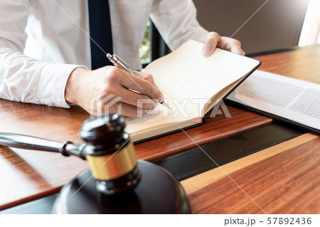 lawyer or judge business man working with 57892436