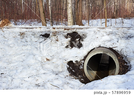 Pipe culvert in the snow winter Pipe culvert in the snow winter 57896959
