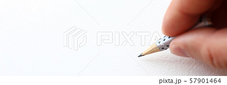 Male hand holding simple pencil stump Male hand holding simple pencil stump 57901464