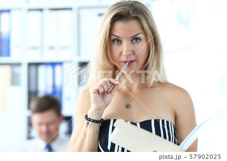 Adult woman with funny expression on her face Adult woman with funny expression on her face 57902025