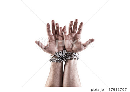 Two hands in chains isolated on white background with clipping path Two hands in chains isolated on white background with clipping path 57911797