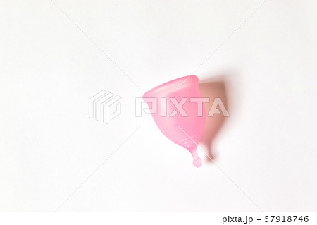 Pink menstrual cup on white background. Flat lay, 57918746