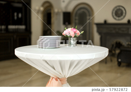 A small auxiliary table in the restaurant, on 57922872