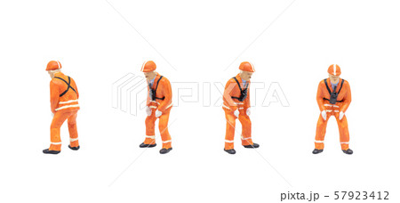 Railway shunter standing and posing in posture isolated on white background. Railway shunter standing and posing in posture isolated on white background. 57923412