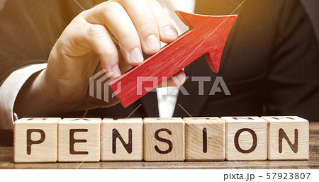 Wooden blocks with the word Pension and up arrow. Improving the financial condition of older people. Surcharge and pension supplements. Loan portfolio growth. Increase pensions fund. Growing payments 57923807