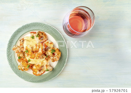 Shrimps with a glass of rose wine, shot from the top with a place for text 57926701
