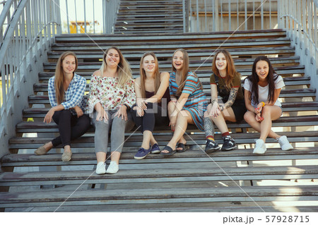 Happy women outdoors on sunny day. Girl power concept. 57928715