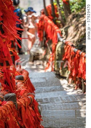 Red ribbons along trail in mountains in 57929470