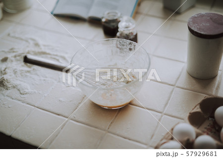 Selective focus of a whisk in the bowl with flour Selective focus of a whisk in the bowl with flour 57929681