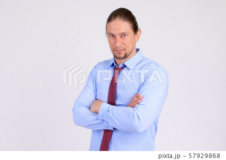 Portrait of handsome businessman with arms crossed Portrait of handsome businessman with arms crossed 57929868