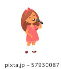 Singing girl in pink dress 57930087