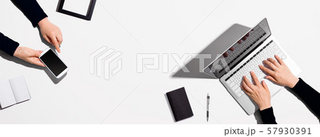 Two people working together 57930391