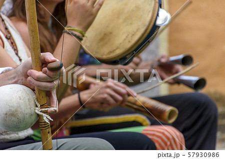 Berimbau and others instruments players during 57930986