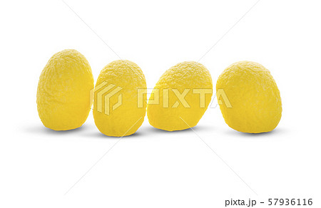 yellow thai silkworm cocoons pile isolated on white background 57936116