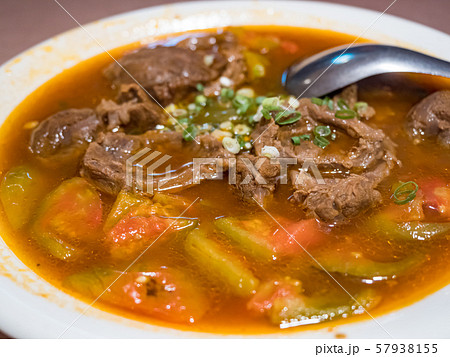 Baked beef stew with tomato 57938155