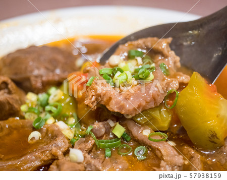 Baked beef stew with tomato Baked beef stew with tomato 57938159