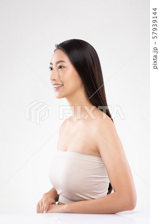 Side view of Beautiful Asian woman smile with clean and fresh skin Happiness and cheerful with positive emotional,isolated on white background,Beauty and Cosmetics Concept Side view of Beautiful Asian woman smile with clean and fresh skin Happiness and cheerful with positive emotional,isolated on white background,Beauty and Cosmetics Concept 57939144