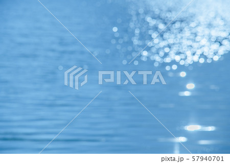 Bokeh on the water surface the background. 57940701