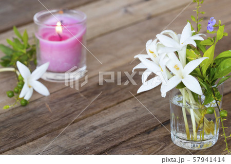 white flowers cock tree local flora of asia and candlelight arrangement flat lay postcard style 57941414