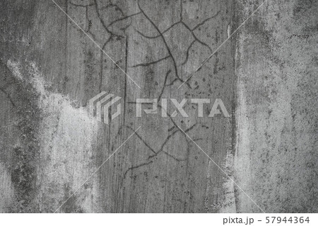 Simple gray concrete wall texture background. Simple gray concrete wall texture background. 57944364